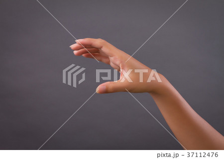 woman hand holding, catching, picking something 37112476
