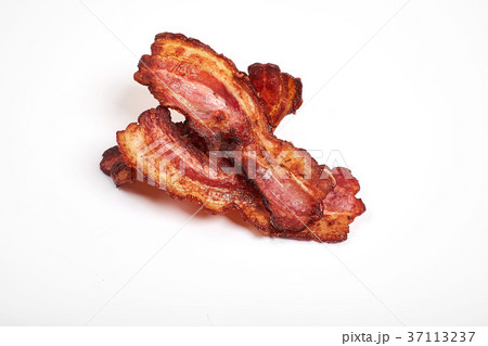 crispy fried bacon isolated on a white background. 37113237