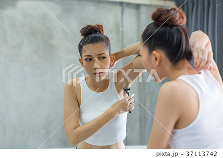 Woman and shaving armpit hair Woman and shaving armpit hair 37113742