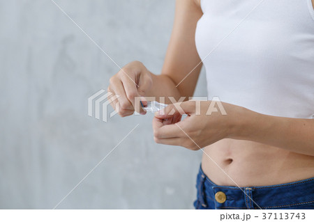 Woman is opening package Woman is opening package 37113743