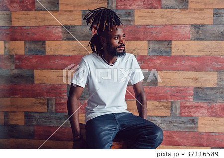 African American man with dreadlocks and a white T African American man with dreadlocks and a white T 37116589