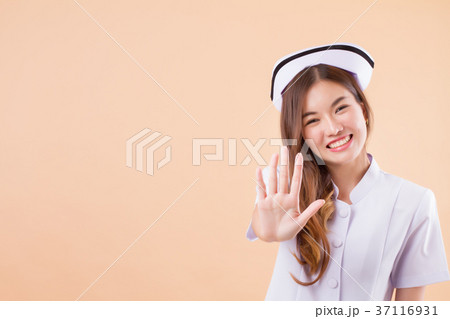 friendly nurse saying no, halt stop hand sign friendly nurse saying no, halt stop hand sign 37116931