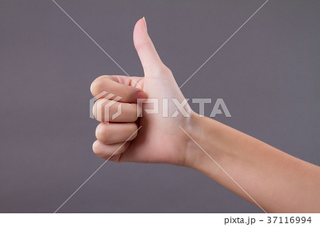 hand showing thumb up, like, good acceptance, okay 37116994