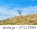 Old white traditional windmill on the hill near 37117094