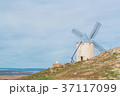 Old white traditional windmill on the hill near  37117099