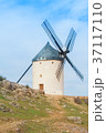 Old white traditional windmill on the hill near  37117110
