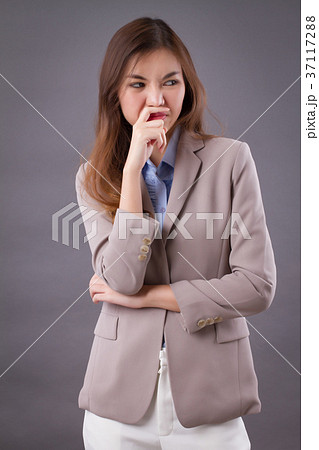 upset woman suffering from stinking bad smell 37117288