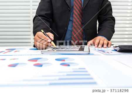 Bankers are recording financial information 37118296