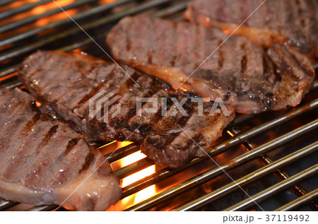 Beef steaks on the grill Beef steaks on the grill 37119492