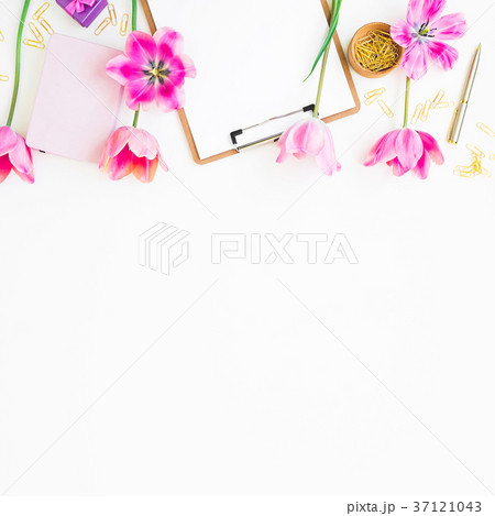 Home workspace with clipboard, diary, pink tulips Home workspace with clipboard, diary, pink tulips 37121043
