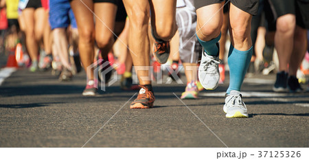 Marathon running race in the light of evening 37125326