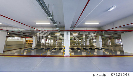 Empty indoor car parking space 37125548