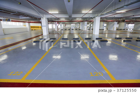 Empty indoor car parking space 37125550