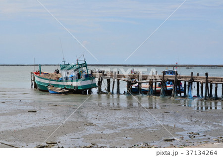 fishing boat on the seacoast. fishing boat on the seacoast. 37134264