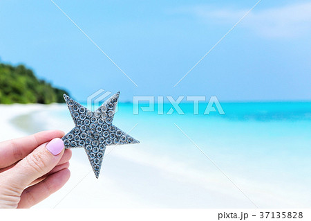 Stars decorations in hand, greeting card 37135828