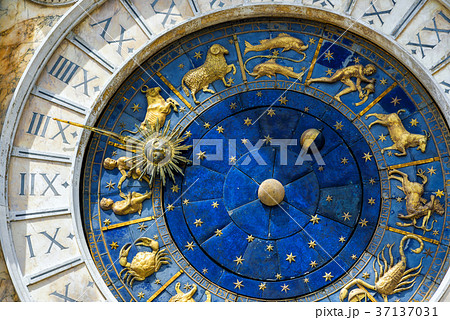 Ancient clock in the St. Mark's Square in Venice Ancient clock in the St. Mark's Square in Venice 37137031