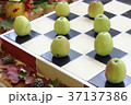 Apples on chessboard 37137386