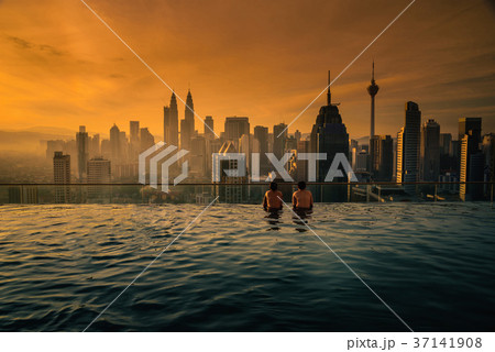 Two traveler man looking view skyline Kuala Lumpur Two traveler man looking view skyline Kuala Lumpur 37141908