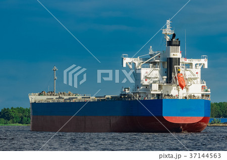 Blue cargo ship underway Blue cargo ship underway 37144563