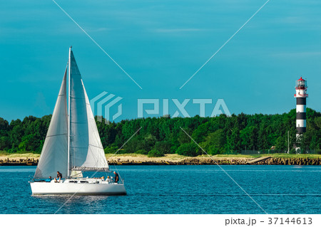 White sailboat traveling at Riga 37144613