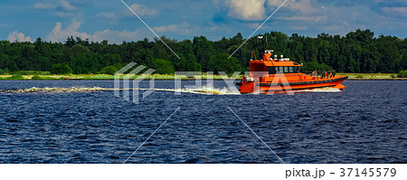 Orange pilot boat in action 37145579