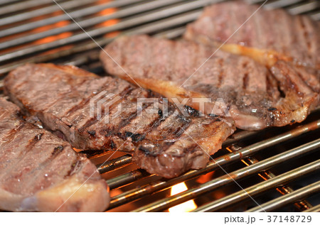 Beef steaks on the grill Beef steaks on the grill 37148729