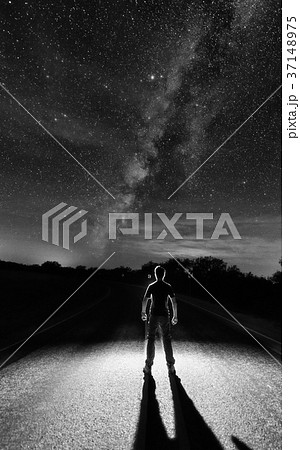 Black and white milky way and human shadow 37148975