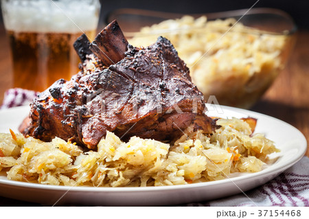Pork knuckle with fried sauerkraut Pork knuckle with fried sauerkraut 37154468