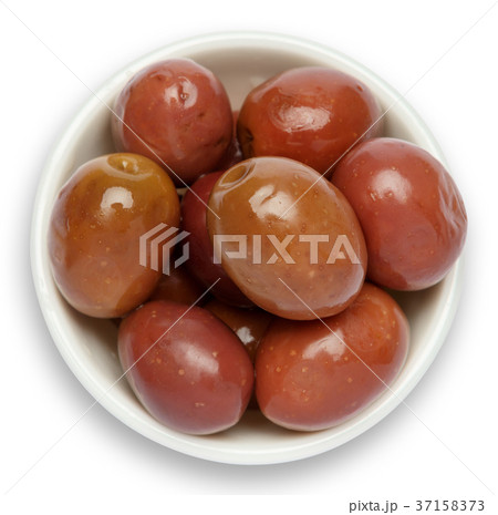 olives in white bowl on white background 37158373