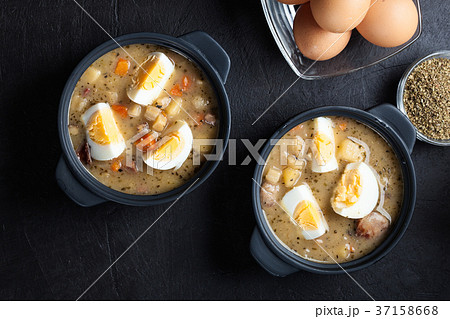 The sour soup made of rye flour with eggs 37158668