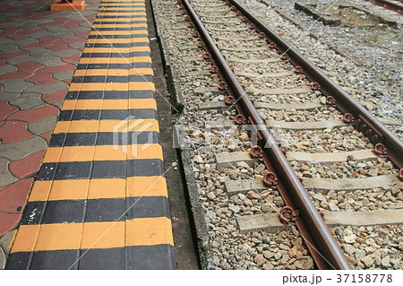 Black and Yellow in train station signal danger 37158778