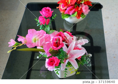 flower in vase ceramic on  the table glass 37159640
