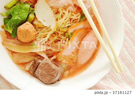 yellow noodles with squid and fish ball in soup yellow noodles with squid and fish ball in soup 37161127