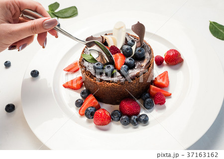tasting sweet chocolate cake dessert recipe 37163162