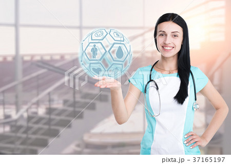 Woman doctor isolated on a clinic background 37165197