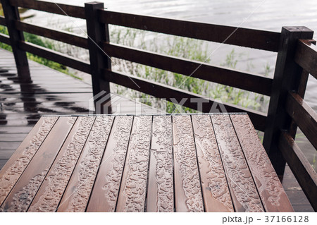 Cottage in forest near river with big wooden 37166128