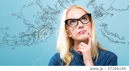 Young woman in a thoughtful pose 37166199