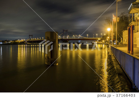 The river Rhine is flooding the promenade The river Rhine is flooding the promenade 37166403