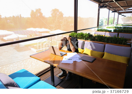 Freelance copywriter rewrite text on laptop at 37166729