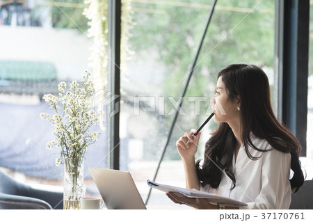 businesswoman analyze market chart at workplace. young female entrepreneur woman working with business document at office. analytic financial accounting plan report. businesswoman analyze market chart at workplace. young female entrepreneur woman working with business document at office. analytic financial accounting plan report. 37170761