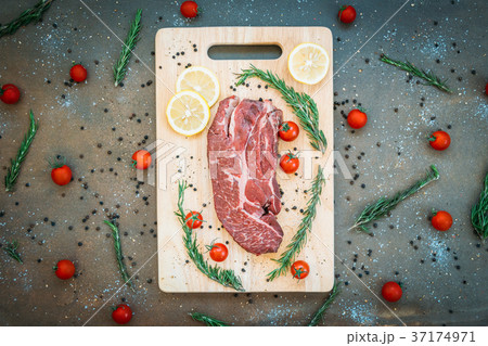 Raw beef meat on cutting board Raw beef meat on cutting board 37174971