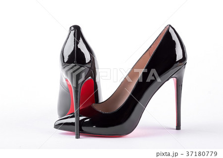 Woman black louboutin on white background. 37180779