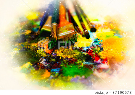 Paint brushes to the painting palette and softly 37190678
