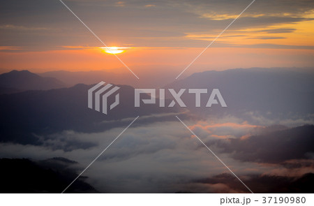 sunrise light and mist 37190980