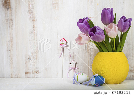 Bouquet purple tulips and Easter eggs Bouquet purple tulips and Easter eggs 37192212