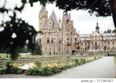 old Polish castle in the village of moszna 37196367