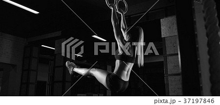 Female fitness athlete exercising 37197846