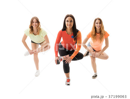 Girls in sports clothes in studio isolated shot Girls in sports clothes in studio isolated shot 37199063