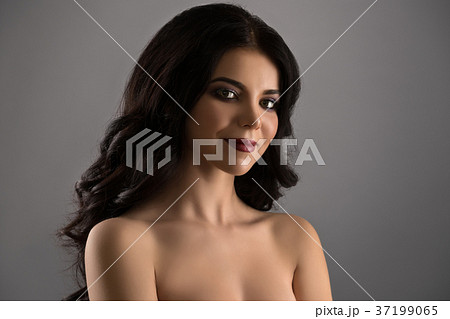 Gorgeous sexy longhaired brunette studio shot Gorgeous sexy longhaired brunette studio shot 37199065