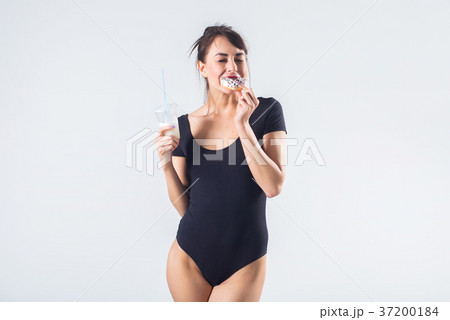 Young brunette model with lollipop studio shot on Young brunette model with lollipop studio shot on 37200184